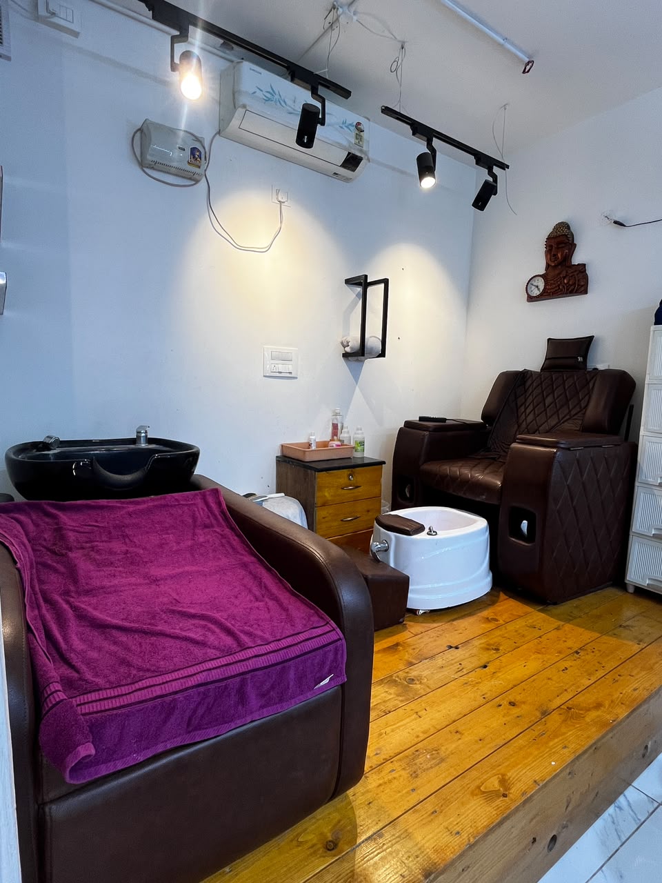 Hair wash basin and pedicure chairs at Signature Beauty Lounge